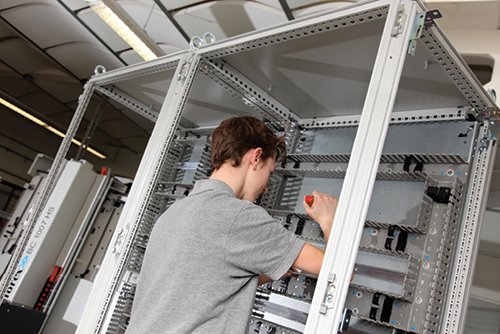 Telecommunications enclosure assembling